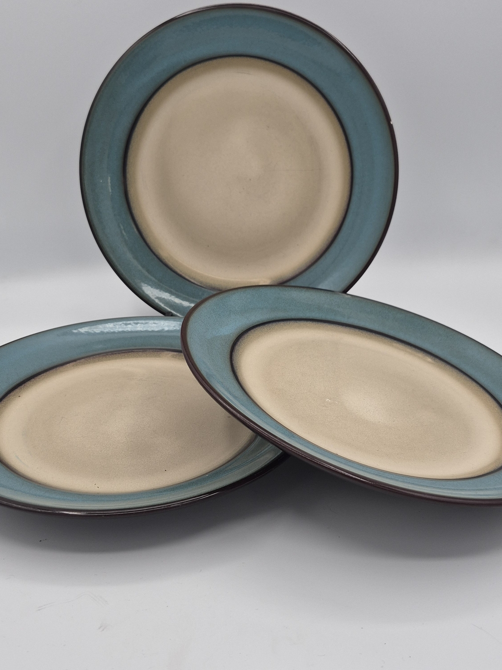 Pier 1 Stoneware "Teal Reactive" Lunch Plates 22.cm in Teal Rim and Cream Center